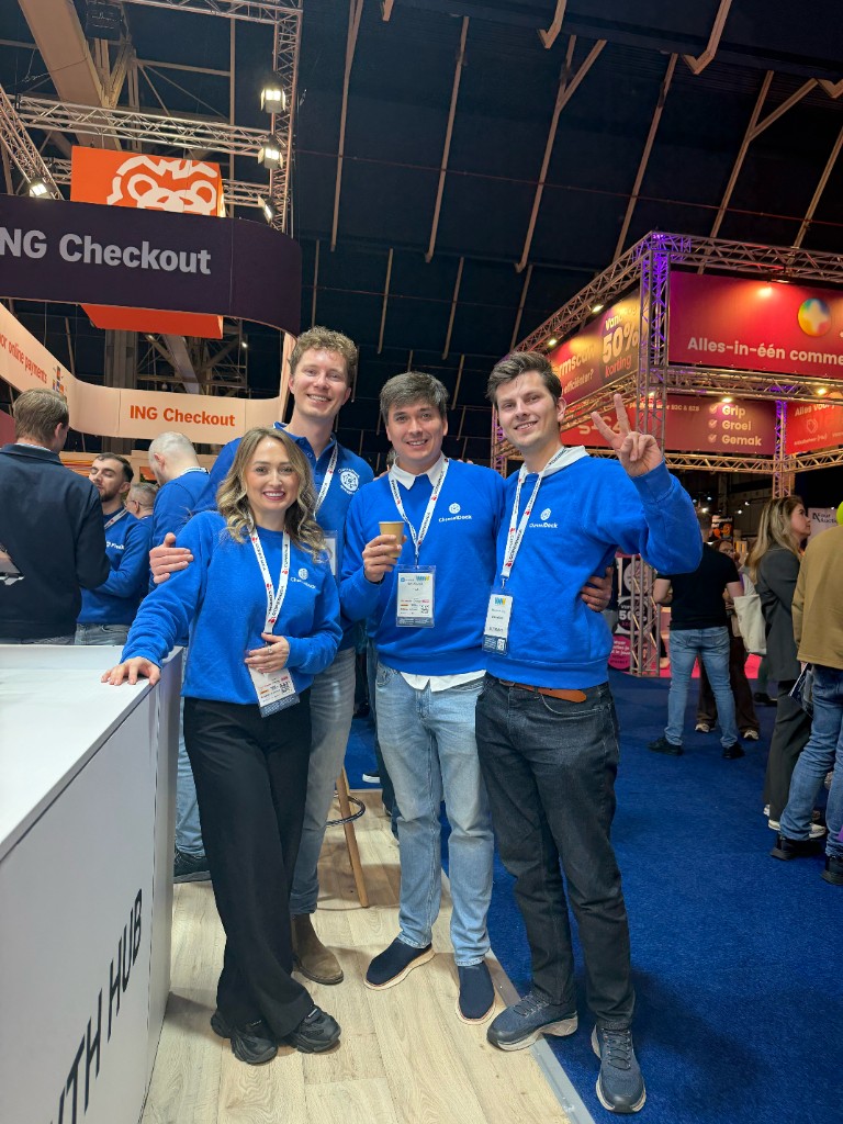 ChannelDock team in matching blue sweatshirts at a commerce conference